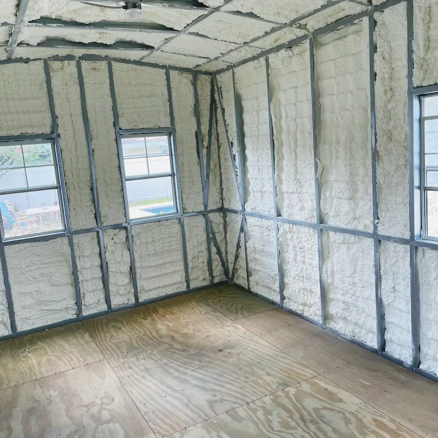 Closed-cell spray foam insulation applied to wall cavities in a residential project in Grandwood Park